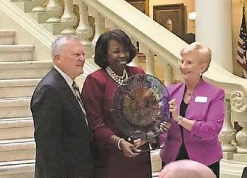 Governor honors Perdue-Smith